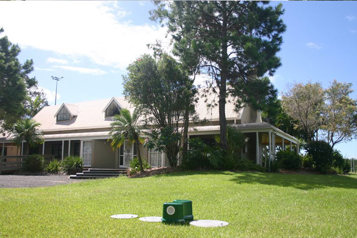 A home with a wastewater system installed in front